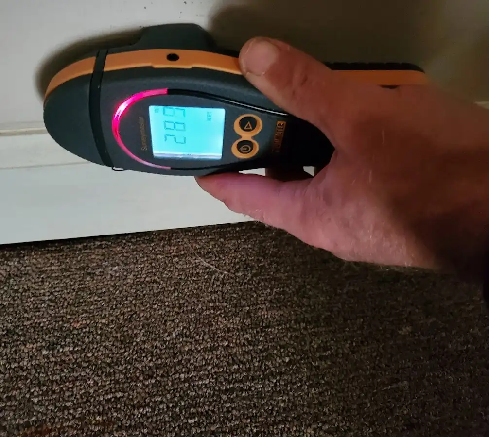 Moisture detection at baseboard during Sewage Cleanup & Sanitation in Broken Arrow
